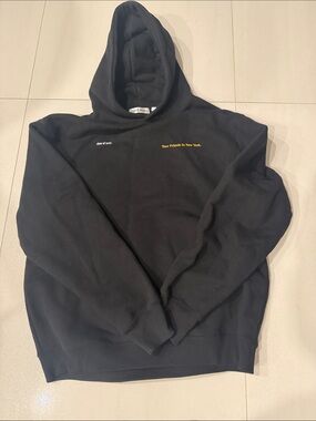 Pyer Moss Black Hoodie with Yellow Chest Text